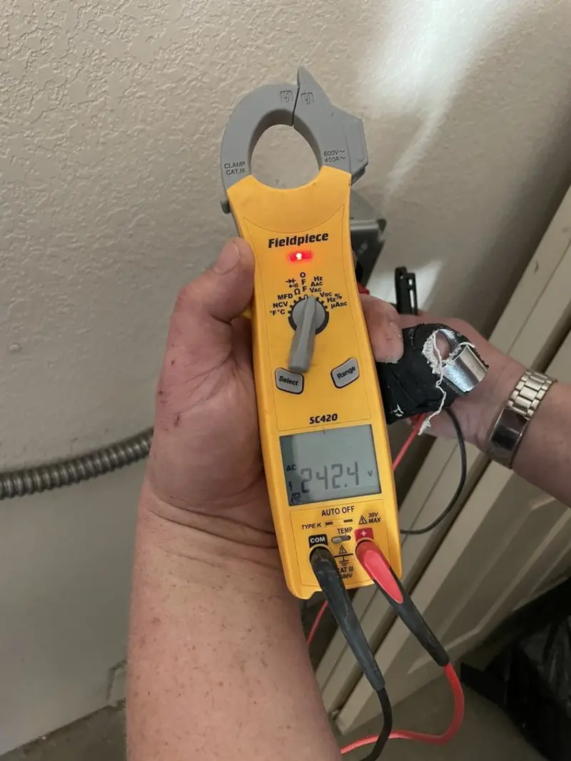 Voltage testing with clamp meter during Circuit Breaker Repair in Yadkinville
